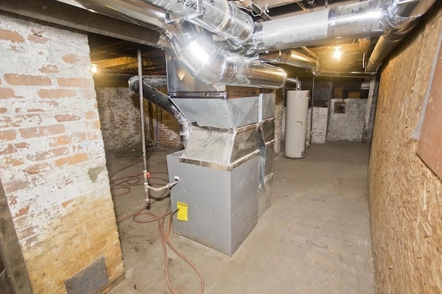 utility room featuring water heater