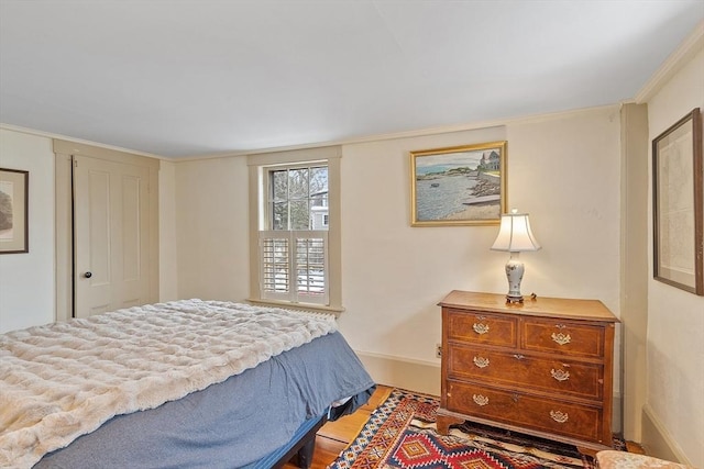 bedroom with light hardwood / wood-style flooring