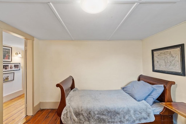 bedroom featuring hardwood / wood-style flooring