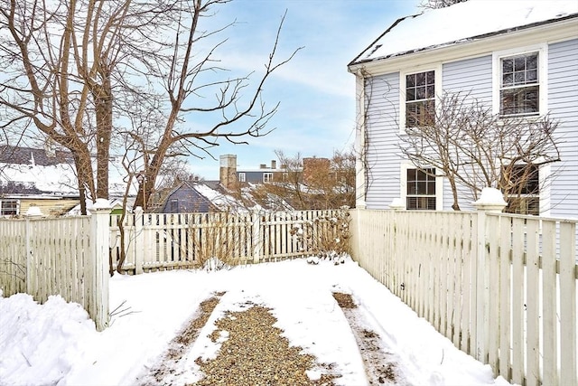 view of yard covered in snow