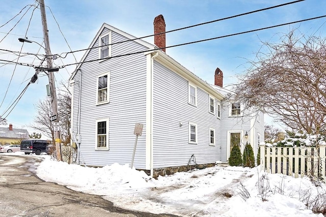 view of snow covered property