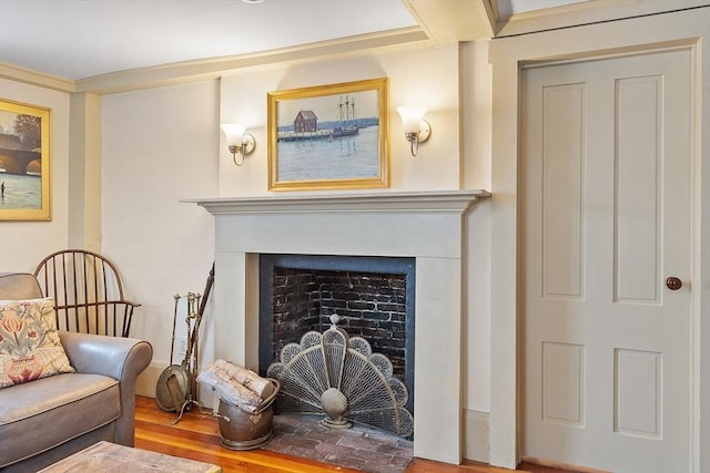 living area with hardwood / wood-style floors