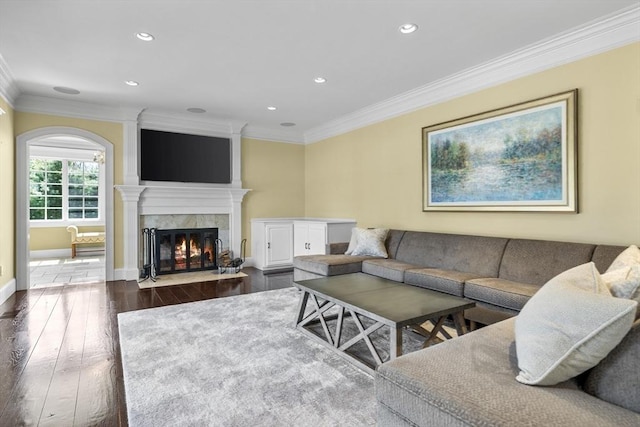 33 Old Concord Rd, Lincoln, MA 01773 - living area with crown molding, recessed lighting, dark wood-style flooring, and a tile fireplace