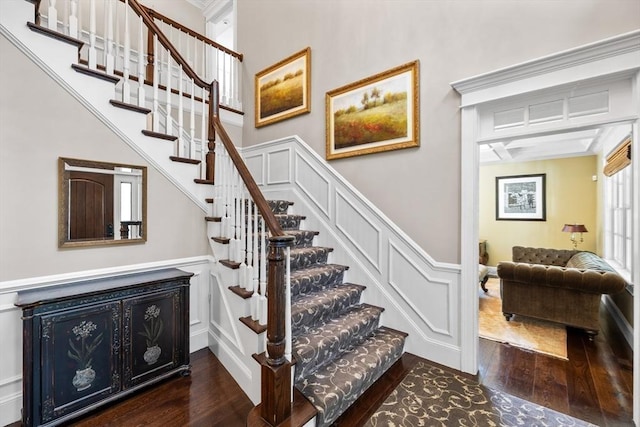 33 Old Concord Rd, Lincoln, MA 01773 - staircase with wainscoting, ornamental molding, and hardwood / wood-style flooring