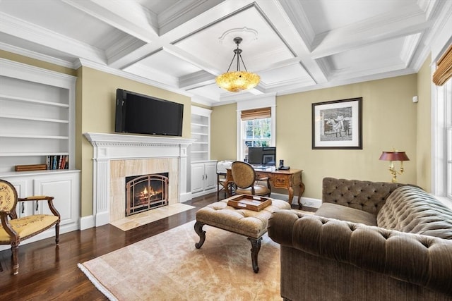 33 Old Concord Rd, Lincoln, MA 01773 - living area featuring built in features, baseboards, a tiled fireplace, and dark wood-type flooring