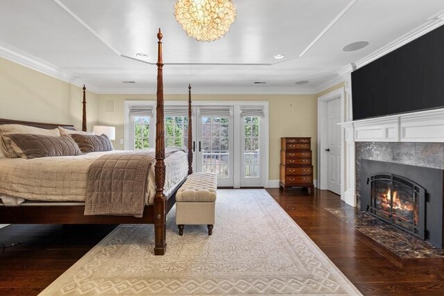 33 Old Concord Rd, Lincoln, MA 01773 - bedroom with access to exterior, crown molding, a fireplace, wood finished floors, and recessed lighting