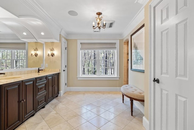 33 Old Concord Rd, Lincoln, MA 01773 - full bathroom with a sink, baseboards, an inviting chandelier, and double vanity