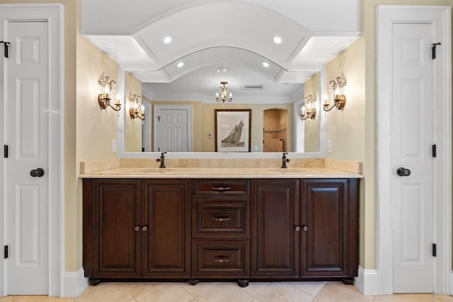 33 Old Concord Rd, Lincoln, MA 01773 - bathroom featuring double vanity, an inviting chandelier, a sink, and a closet