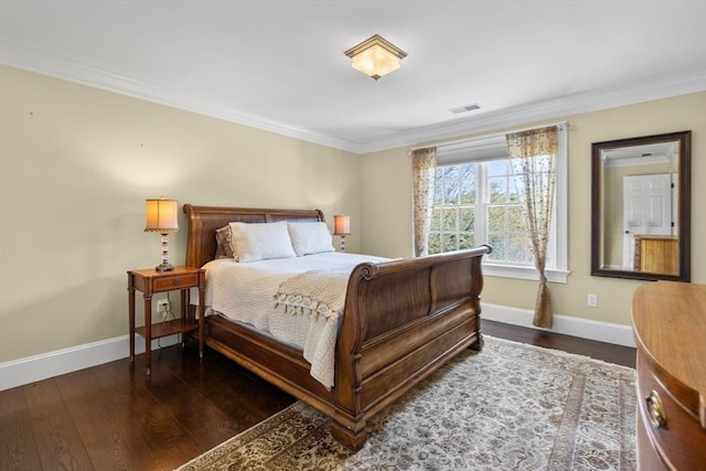 33 Old Concord Rd, Lincoln, MA 01773 - bedroom with crown molding, baseboards, visible vents, and wood finished floors