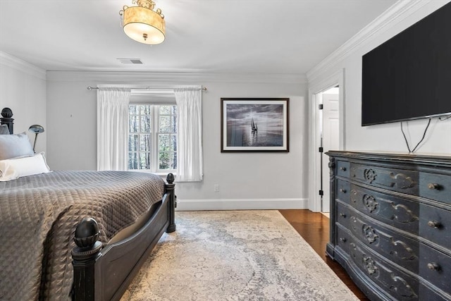 33 Old Concord Rd, Lincoln, MA 01773 - bedroom with baseboards, visible vents, ornamental molding, and wood finished floors