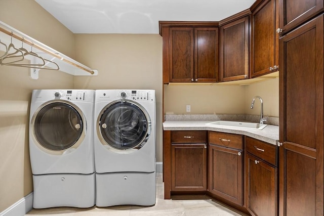 33 Old Concord Rd, Lincoln, MA 01773 - clothes washing area with independent washer and dryer, a sink, and cabinet space
