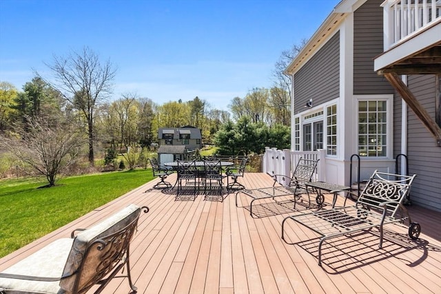 33 Old Concord Rd, Lincoln, MA 01773 - deck with outdoor dining area and a lawn