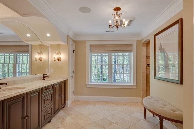 33 Old Concord Rd, Lincoln, MA 01773 - full bathroom featuring a sink, baseboards, an inviting chandelier, and visible vents