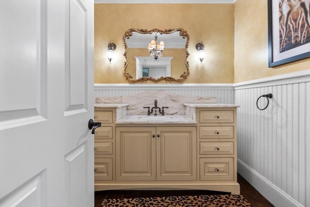 33 Old Concord Rd, Lincoln, MA 01773 - bathroom with vanity and wainscoting