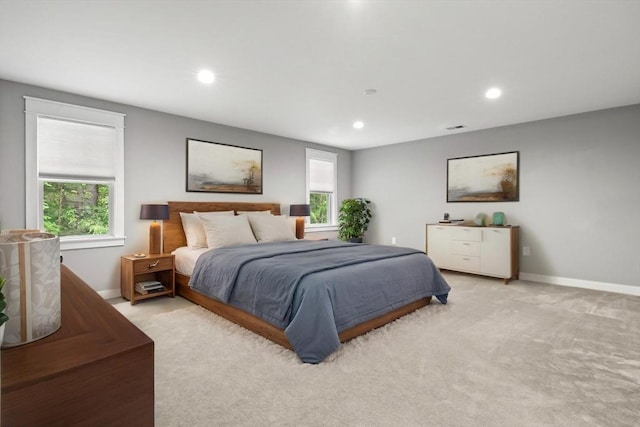 15 Village Ln Unit 15, Wayland, MA 01778 - bedroom with multiple windows, light carpet, and recessed lighting