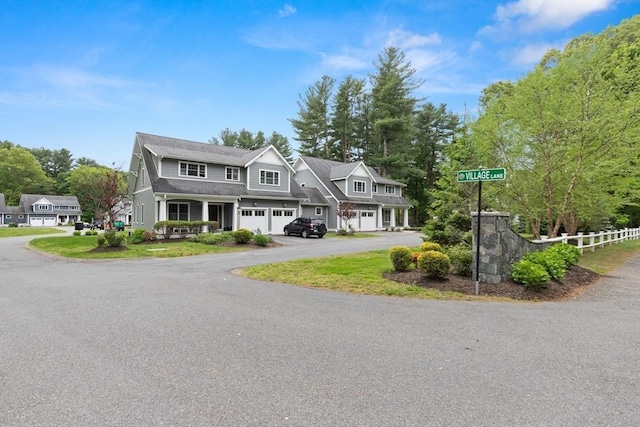 15 Village Ln Unit 15, Wayland, MA 01778 - shingle-style home featuring a garage and driveway
