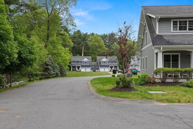 15 Village Ln Unit 15, Wayland, MA 01778 - view of asphalt street with a residential view