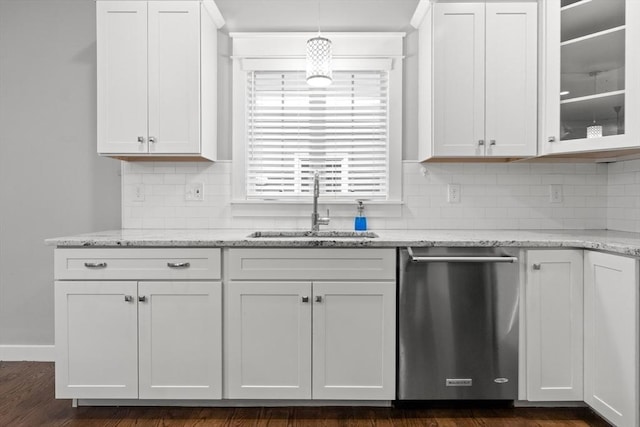 15 Village Ln Unit 15, Wayland, MA 01778 - kitchen with stainless steel dishwasher, white cabinets, and decorative backsplash