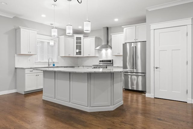 15 Village Ln Unit 15, Wayland, MA 01778 - kitchen with high end fridge, wall chimney exhaust hood, stove, a kitchen island, and recessed lighting
