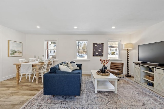 living room with light hardwood / wood-style floors