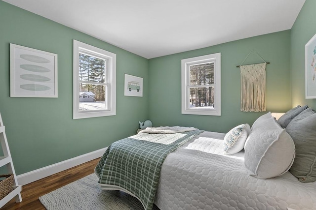 bedroom featuring dark wood-type flooring