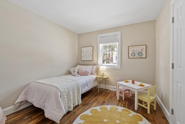 bedroom featuring dark hardwood / wood-style floors