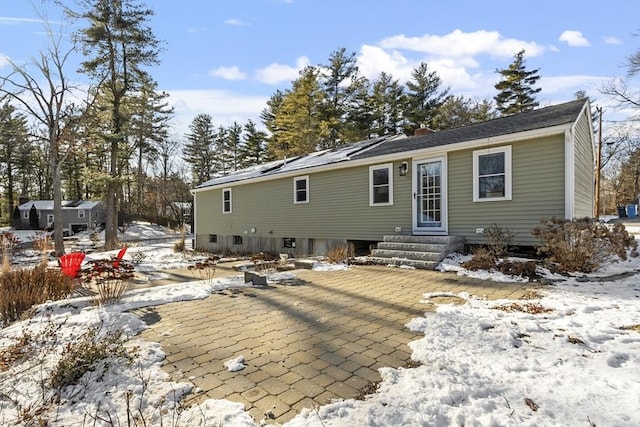 view of front of property with a patio