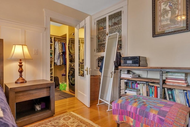 8 Colbourne Cres Unit 1, Brookline, MA 02445 - bedroom with wood finished floors, a spacious closet, and a closet