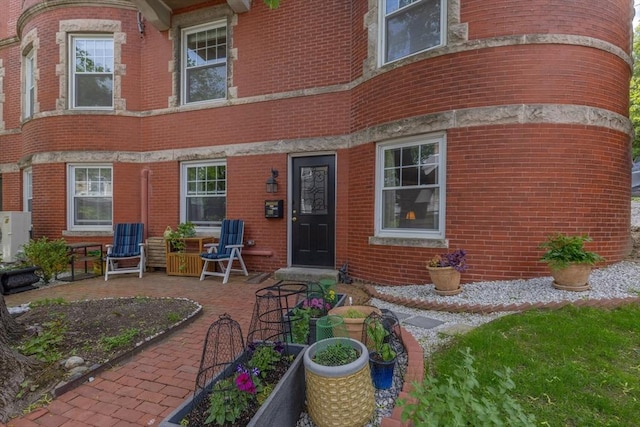 8 Colbourne Cres Unit 1, Brookline, MA 02445 - doorway to property with brick siding