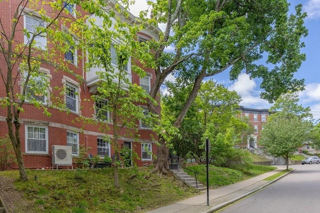 8 Colbourne Cres Unit 1, Brookline, MA 02445 - view of building exterior featuring a cooling unit