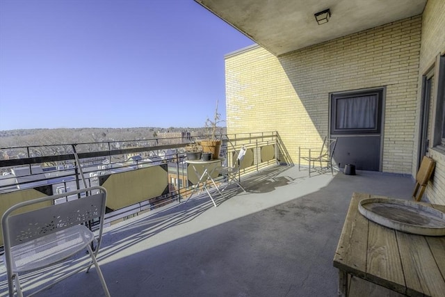 view of patio / terrace with a balcony