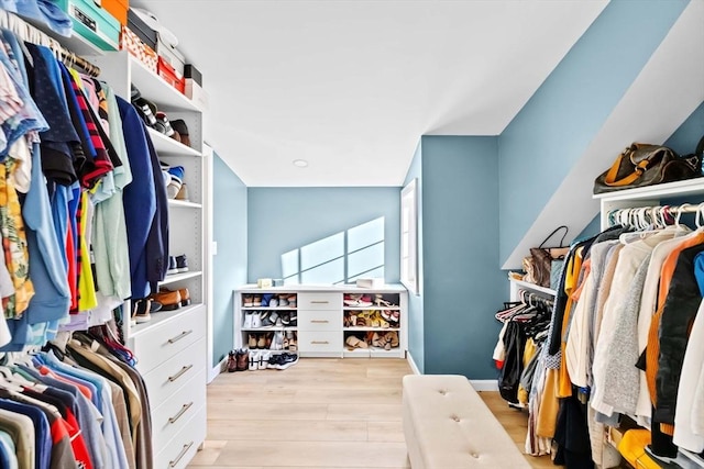 spacious closet featuring light wood-type flooring