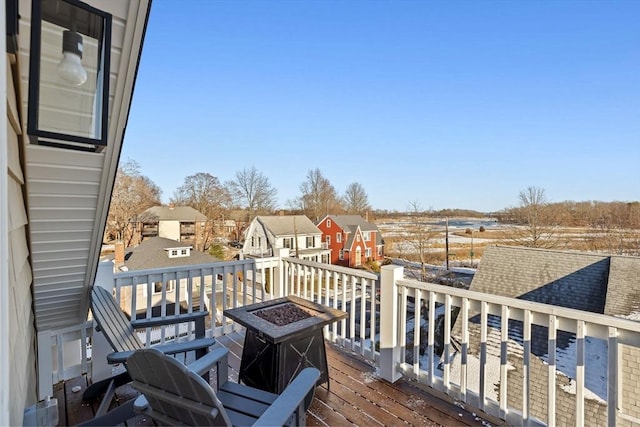 deck featuring an outdoor fire pit