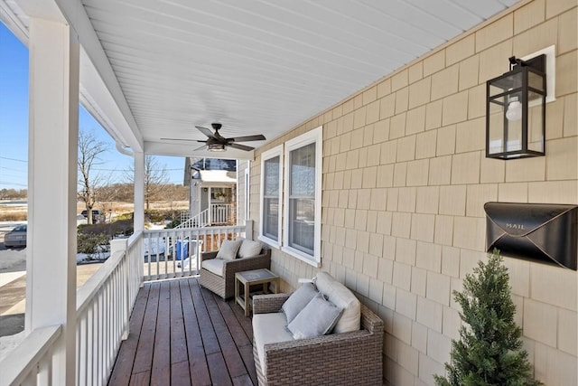 wooden deck with ceiling fan