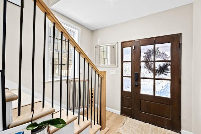 foyer with light hardwood / wood-style flooring