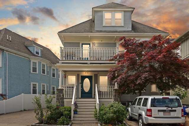 870 S S Unit 3, Boston, MA 02131 - view of front of property featuring covered porch, a balcony, and roof with shingles
