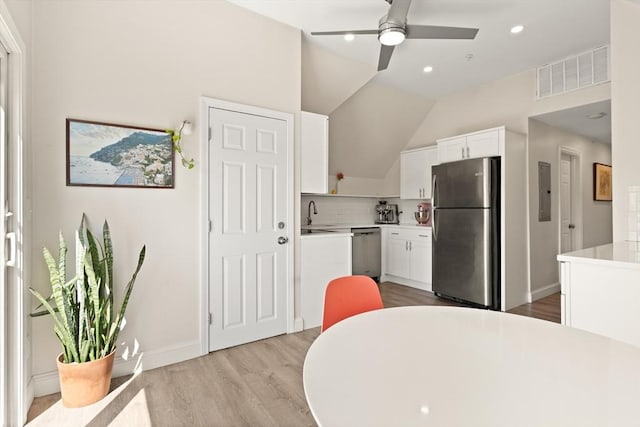 870 S S Unit 3, Boston, MA 02131 - kitchen featuring appliances with stainless steel finishes, ceiling fan, white cabinetry, light wood-style floors, and recessed lighting