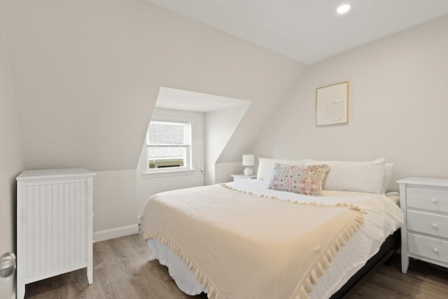 870 S S Unit 3, Boston, MA 02131 - bedroom featuring vaulted ceiling, wood finished floors, radiator, baseboards, and recessed lighting