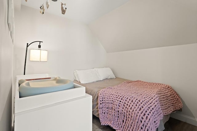 870 S S Unit 3, Boston, MA 02131 - bedroom with lofted ceiling, wood finished floors, and baseboards