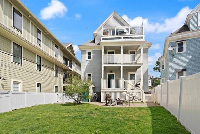 870 S S Unit 3, Boston, MA 02131 - rear view of property featuring a balcony, a gate, and a patio area