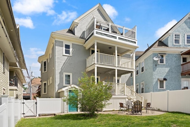 870 S S Unit 3, Boston, MA 02131 - rear view of house featuring a balcony, a gate, and a patio