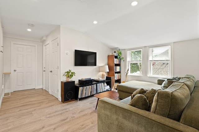 870 S S Unit 3, Boston, MA 02131 - living room with light wood-style floors, lofted ceiling, and recessed lighting