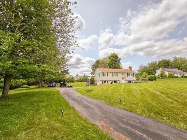 264 Dresser Hill Rd, Dudley, MA 01571 - bi-level home featuring a chimney and a front yard