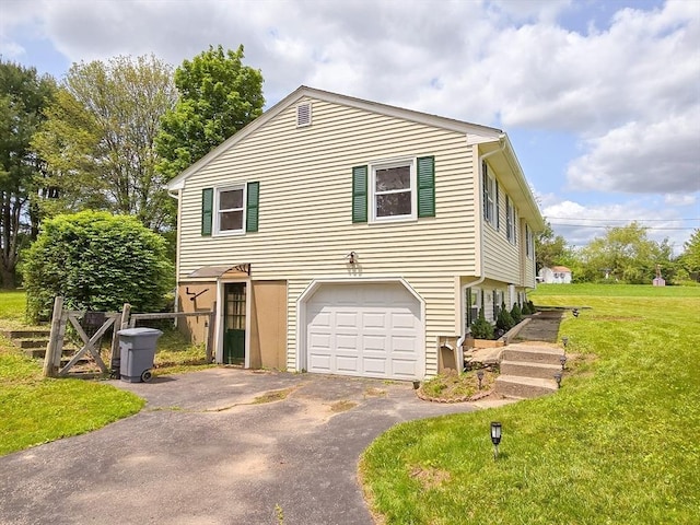 264 Dresser Hill Rd, Dudley, MA 01571 - view of property exterior with asphalt driveway, a lawn, and an attached garage