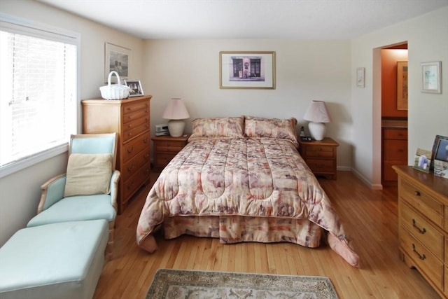1504 Huckleberry Ct Unit 1504, Peabody, MA 01960 - bedroom with wood finished floors and baseboards