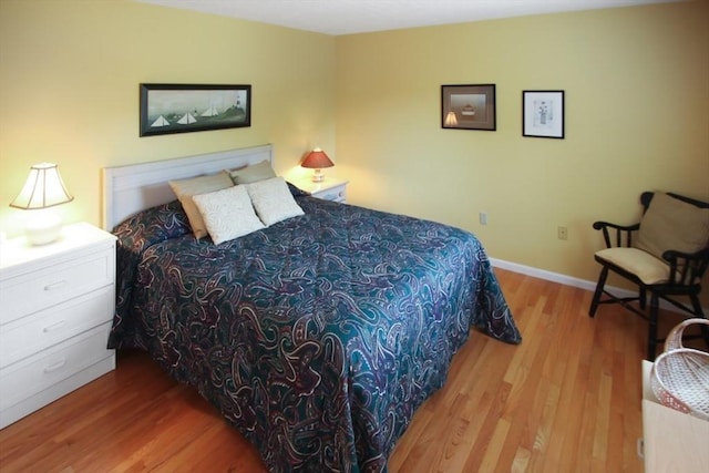 1504 Huckleberry Ct Unit 1504, Peabody, MA 01960 - bedroom with wood finished floors and baseboards