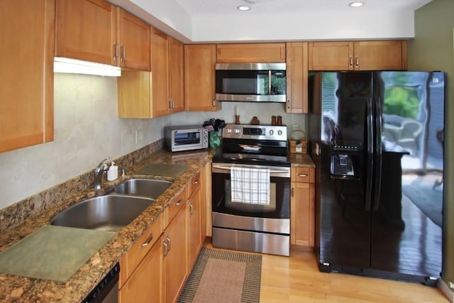 1504 Huckleberry Ct Unit 1504, Peabody, MA 01960 - kitchen with stainless steel appliances, a sink, light wood-style floors, dark stone counters, and recessed lighting
