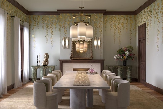 dining space with wallpapered walls, a chandelier, wood finished floors, and ornamental molding