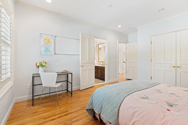 bedroom with crown molding, baseboards, multiple windows, and light wood-type flooring