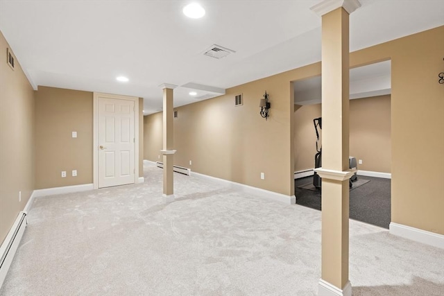 finished below grade area featuring light carpet, baseboard heating, recessed lighting, and visible vents